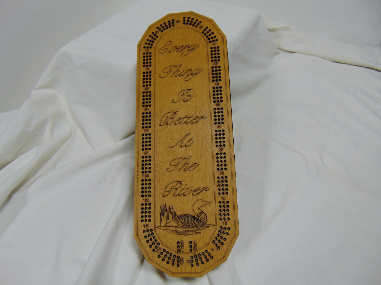 At the River Cribbage board