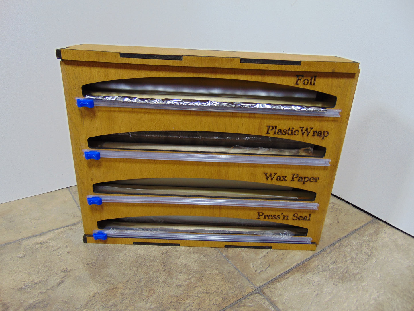 4 in 1 Wrap Organizer with Cutter and Labeled, Plastic Wrap, Aluminum Foil, Wax Paper, and Press’n Seal Dispenser for Kitchen Storage Organization Holder for 12" Roll